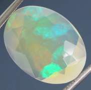Floral glittering 2.46ct faceted Jelly Opal