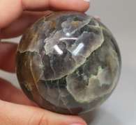 Amazing color! 1,776ct  galaxy patterned Iolite sphere