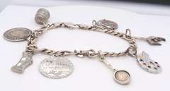 Vintage Sterling Silver Figaro Bracelet with Charms