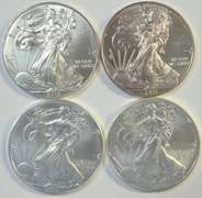 4 Superb Gem BU $1 Silver Eagles from 2011 to 2014