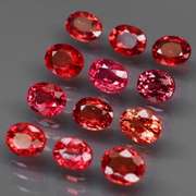 Brilliant 4.15ct fancy red orange Songean Sapphire set