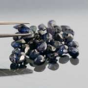 Stunning ink blue 7.14ct pear cut Sapphire set