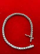 14K WHITE GOLD AND 4.00 CARATS OF DIAMONDS BRACELET.
