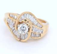 Sparkling Yellow Gold Round Brilliant Cut and Baguette Swirl Engagement Ring