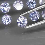 Heavy flashing 6.30ct diamond cut Tanzanite set