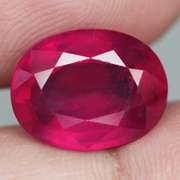 Stunning 7.36ct top blood red Ruby center stone