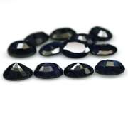 Heated only! 12.46ct dark blue Sapphire set from Madagascar