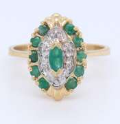 Festive Yellow Gold Emerald Ring
