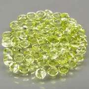 High grade 4.85ct untreated apple green Peridot set