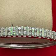18KT WHITE GOLD DIAMOND BANGLE BRACELET.