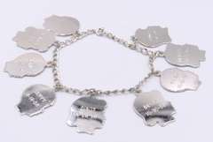 Vintage Sterling Silver Bracelet with 10 Signed Charms