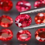 Brilliant 4.15ct fancy red orange Songean Sapphire set