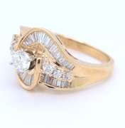 Sparkling Yellow Gold Round Brilliant Cut and Baguette Swirl Engagement Ring
