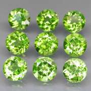 Excellent 8.26ct 6mm round cut Peridot set