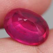 Stunning 7.36ct top blood red Ruby center stone