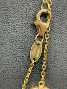 18K YELLOW GOLD STATION NECKLACE.