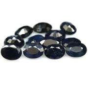 Heated only! 12.46ct dark blue Sapphire set from Madagascar