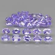 Glittering 5.33ct bright violet Tanzanite set