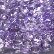 Heavy flashing 5.14ct diamond cut Tanzanite set