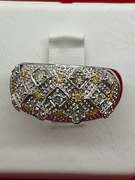 LADIES 18K WHITE GOLD AND DIAMOND BAND.