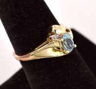 Sensational Topaz Swirl Ring in Yellow Gold