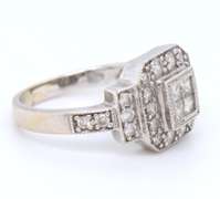 LADIES 14 KT WHITE GOLD 1.00 CARAT DIAMOND RING.