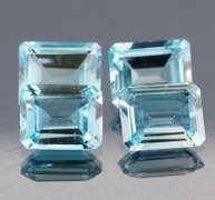 Large 14.89ct vivid blue emerald cut Topaz set