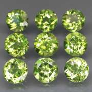 High grade 8.40ct untreated apple green Peridot set
