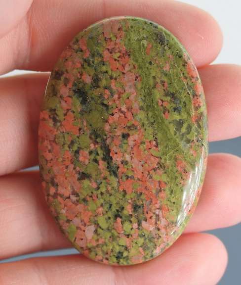Eye catching 109.46ct Unakite cabochon
