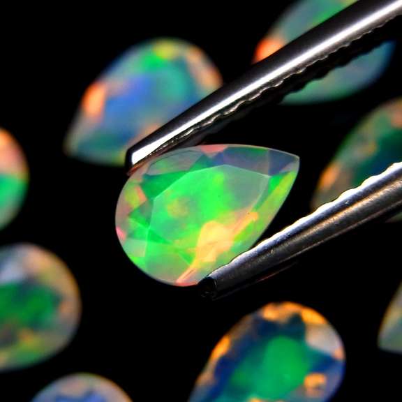 Smoldering 2.20ct unheated faceted Jelly Opal set