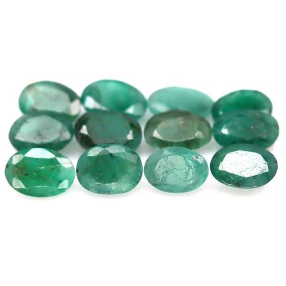 Rich emerald green 7.22ct 12pc emerald set