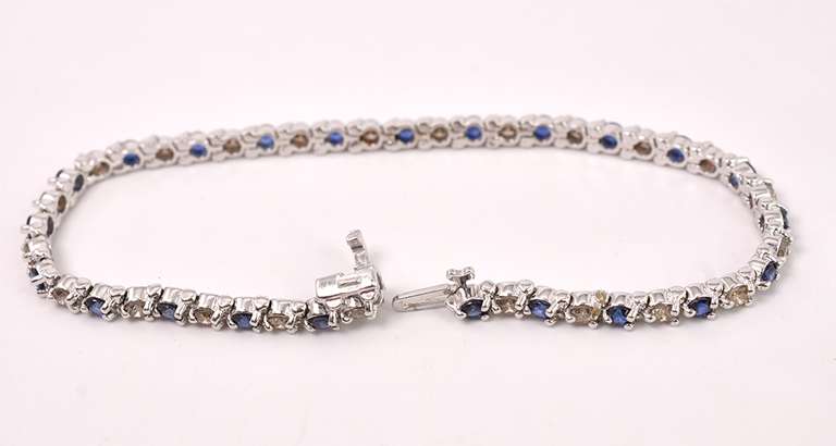 Delightful Diamond and Sapphire Tennis Bracelet in 14K White Gold