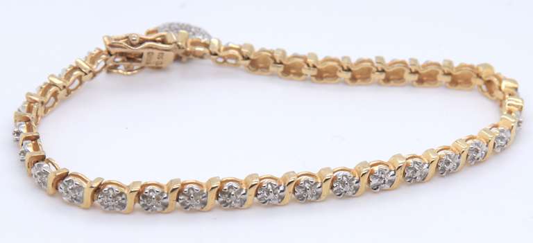 Sterling Silver Cubic Zirconia Tennis Bracelet with Heart Shaped Charm
