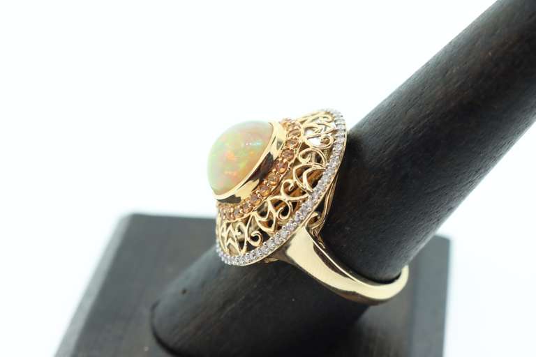 Ladies 14k gold opal and diamond ring