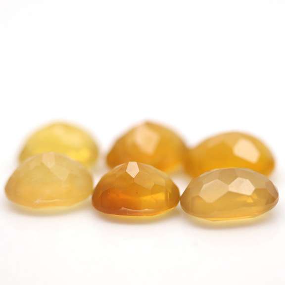 Glistening 25.71ct natural golden Fire Opal set