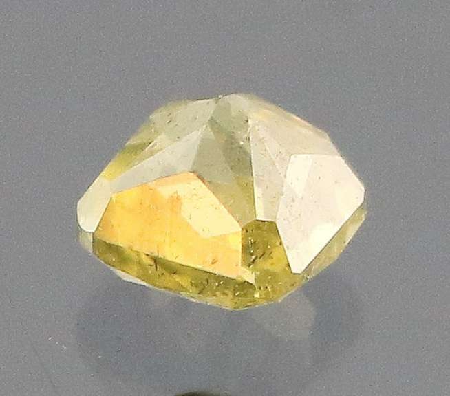 Sparkling .20ct cushion cut yellow Diamond