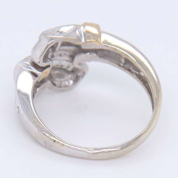 Sparkling White Gold Channel Set Baguette and Round Diamond Bypass Ring