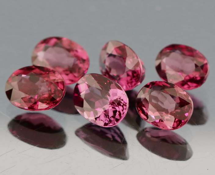 Remarkable 9.53ct violet pink Rhodolite Garnet set