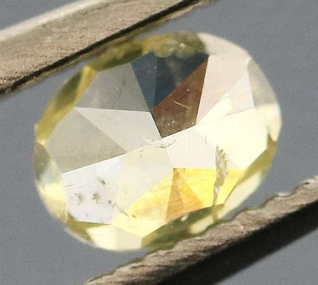 Rare .26ct oval cut yellow Diamond