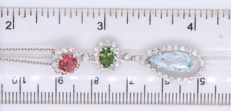 Charming White Gold Turmaline, Aquamarine and Diamond Pendant on Chain