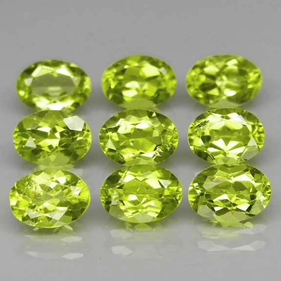 Dazzling 7.64ct untreated apple green Peridot set
