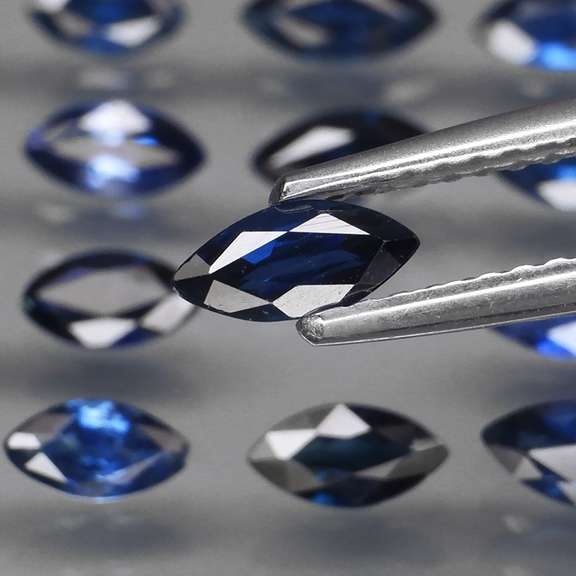 Heated only! 3.26ct marquise cut Sapphire set