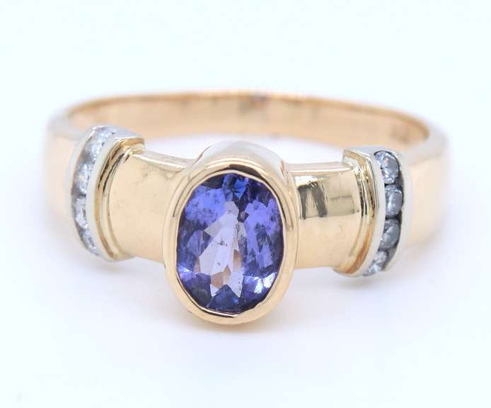 Powerful Yellow Gold Tanzanite Bezel Set and Diamond Side Ring