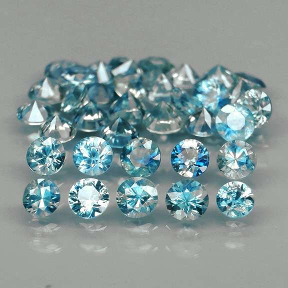 Heated only! 3.90ct blue green Sapphire set