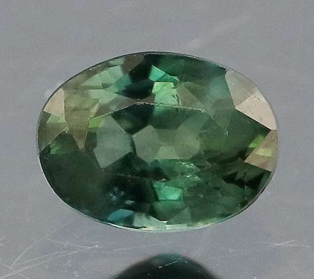 Party color! .60ct blue green Sapphire -Heated only!