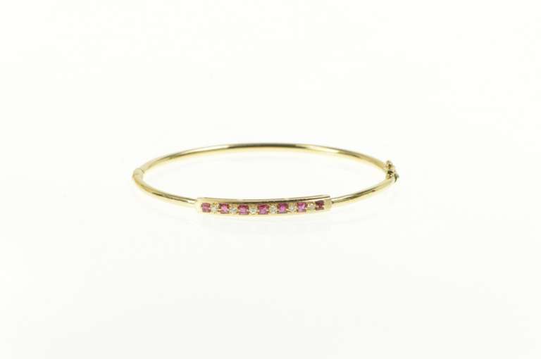 14K Yellow Gold 0.75 Ctw Ruby Diamond Inset Oval Bangle Bracelet