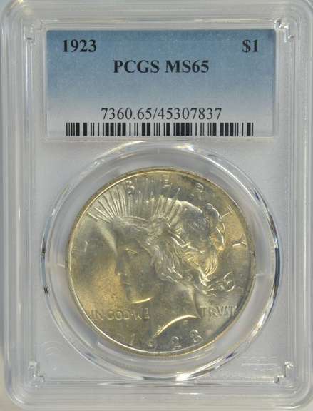 Solid lustrous Gem BU 1923 Peace Silver Dollar. PCGS MS65