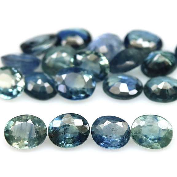 Heated only! 8.23ct blue green Sapphire set