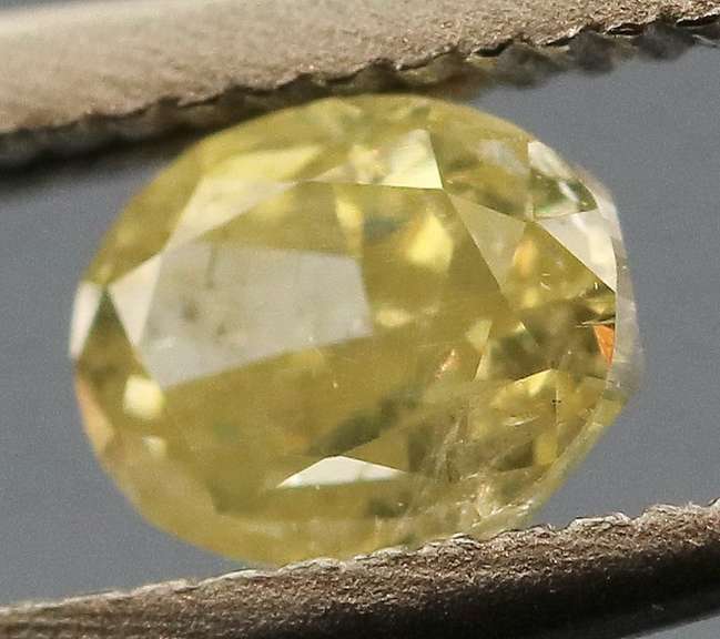 Rare .26ct oval cut yellow Diamond
