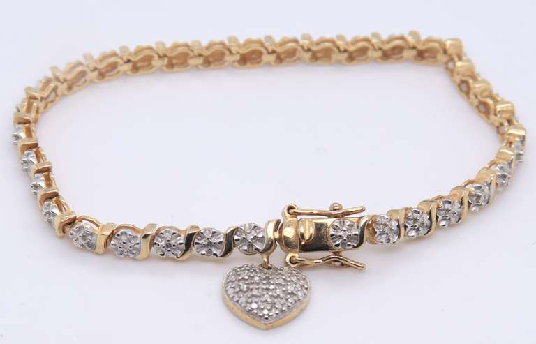 Sterling Silver Cubic Zirconia Tennis Bracelet with Heart Shaped Charm
